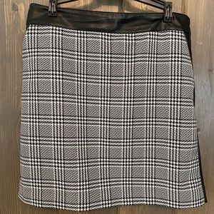 Leather and plaid mini skirt